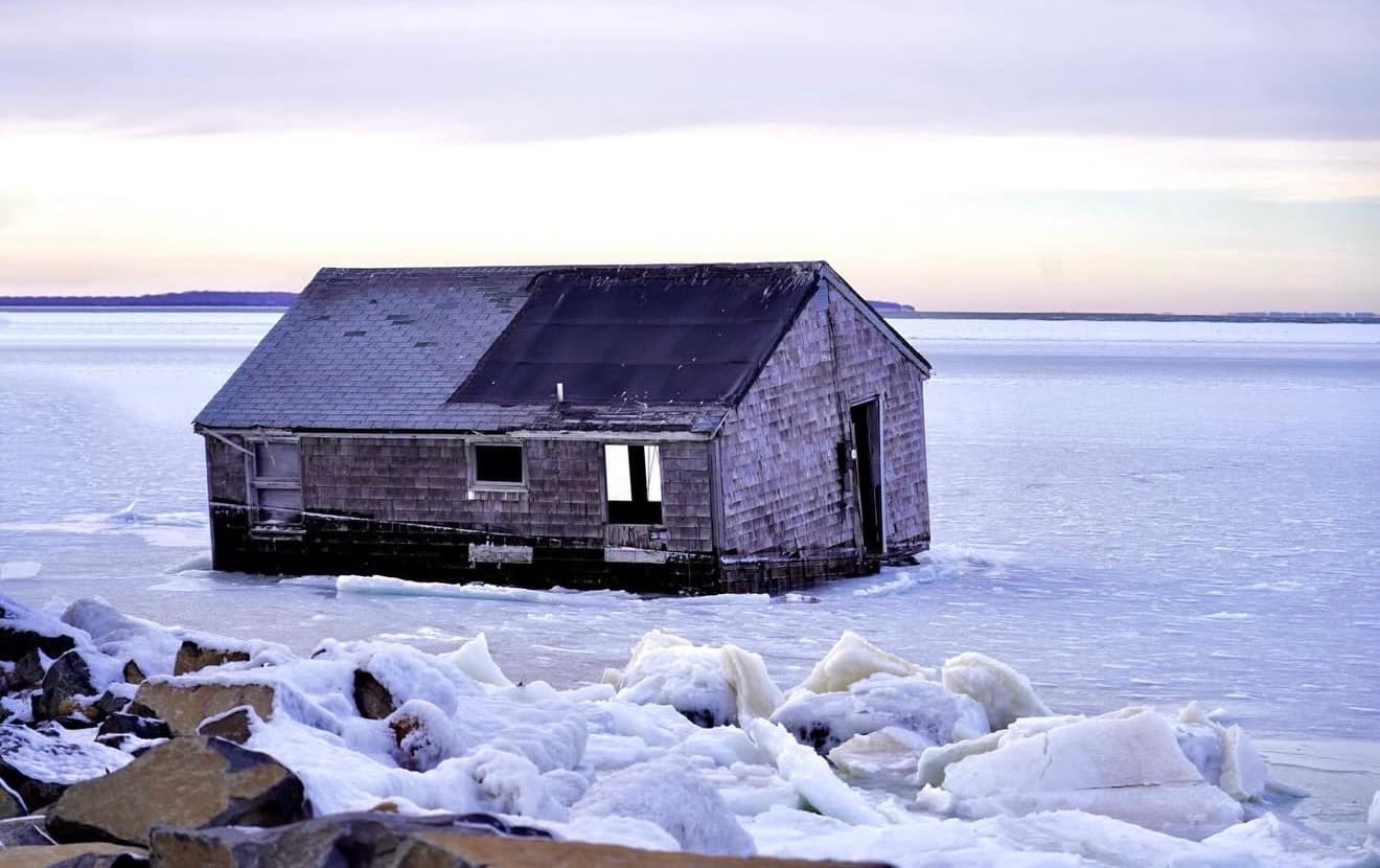 The iconic stilt house of Lazy Point has finally fallen.